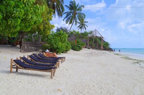On the beach, white sand