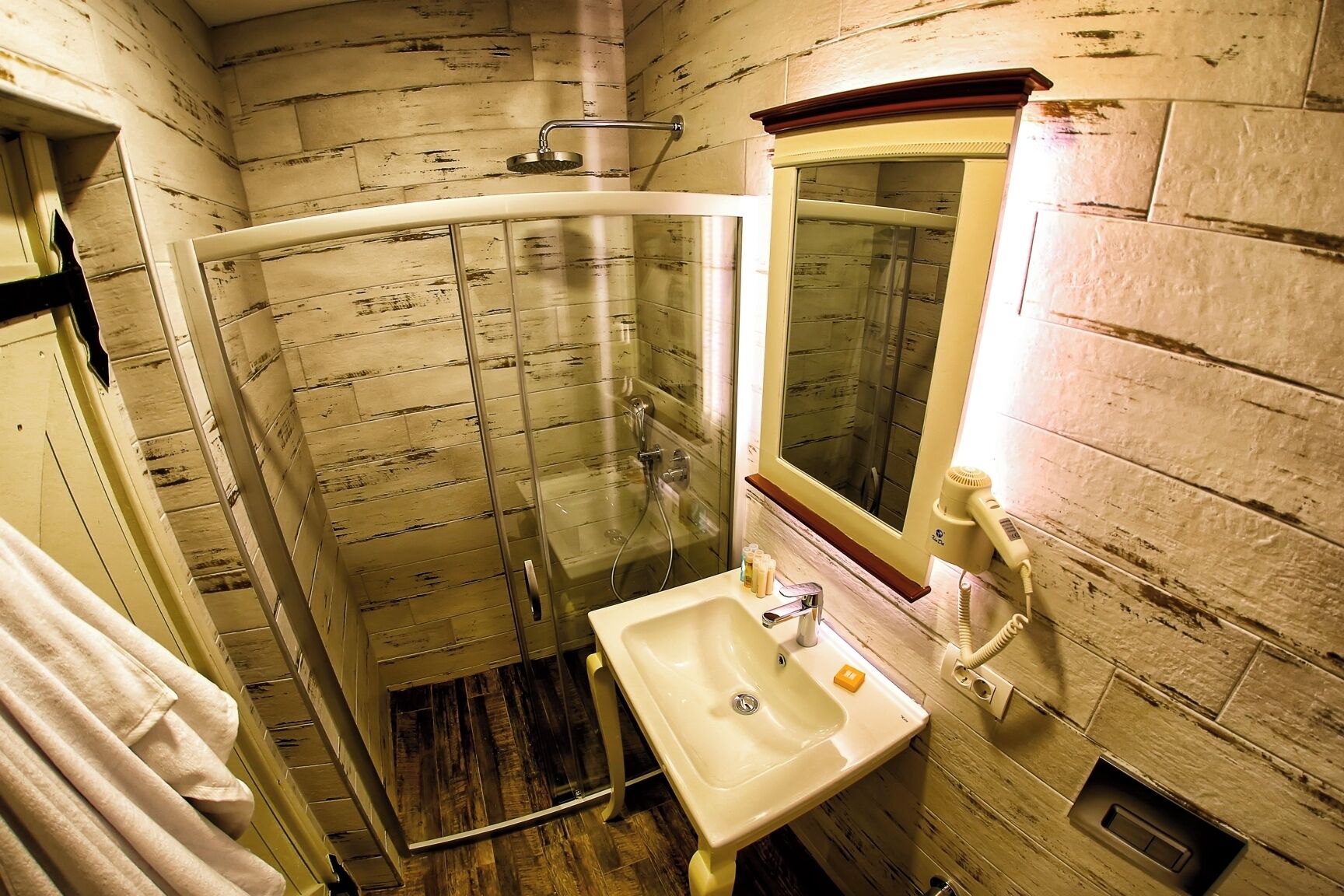 economy room | bathroom | shower, rainfall showerhead, hair dryer, towels