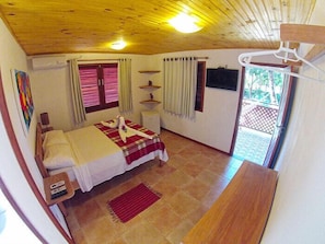 Quarto casal standard, 1 cama de casal, varanda coberta | Frigobar, Wi-Fi de cortesia, roupa de cama