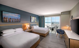 Quarto superior, 2 camas Queen, vista para o oceano | Vista para praia/oceano