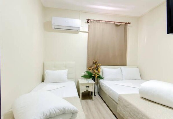 Standard-Dreibettzimmer