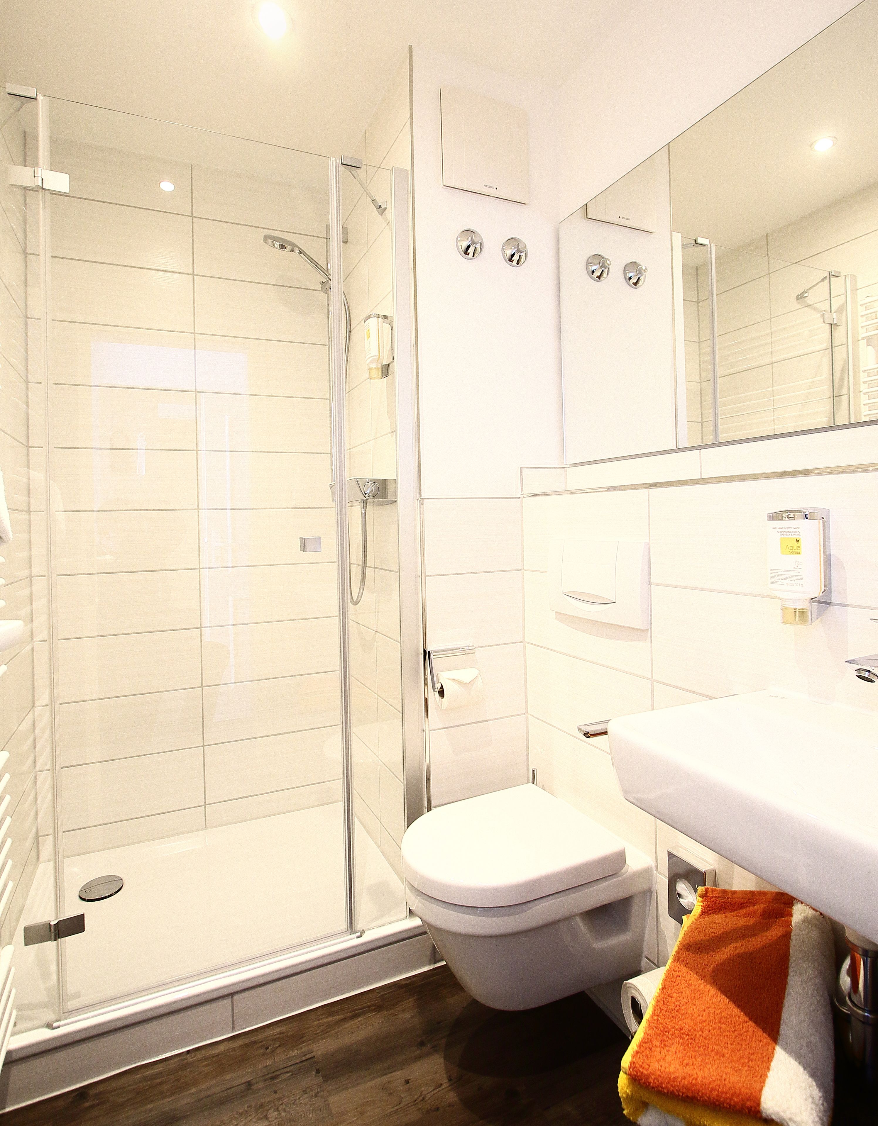 family room, garden view | bathroom | shower, free toiletries, hair dryer, towels