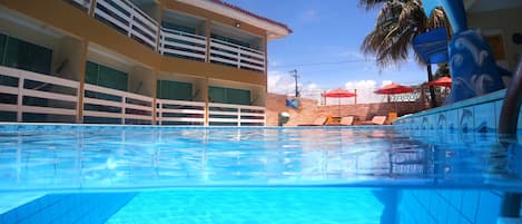 Outdoor pool, pool umbrellas, pool loungers