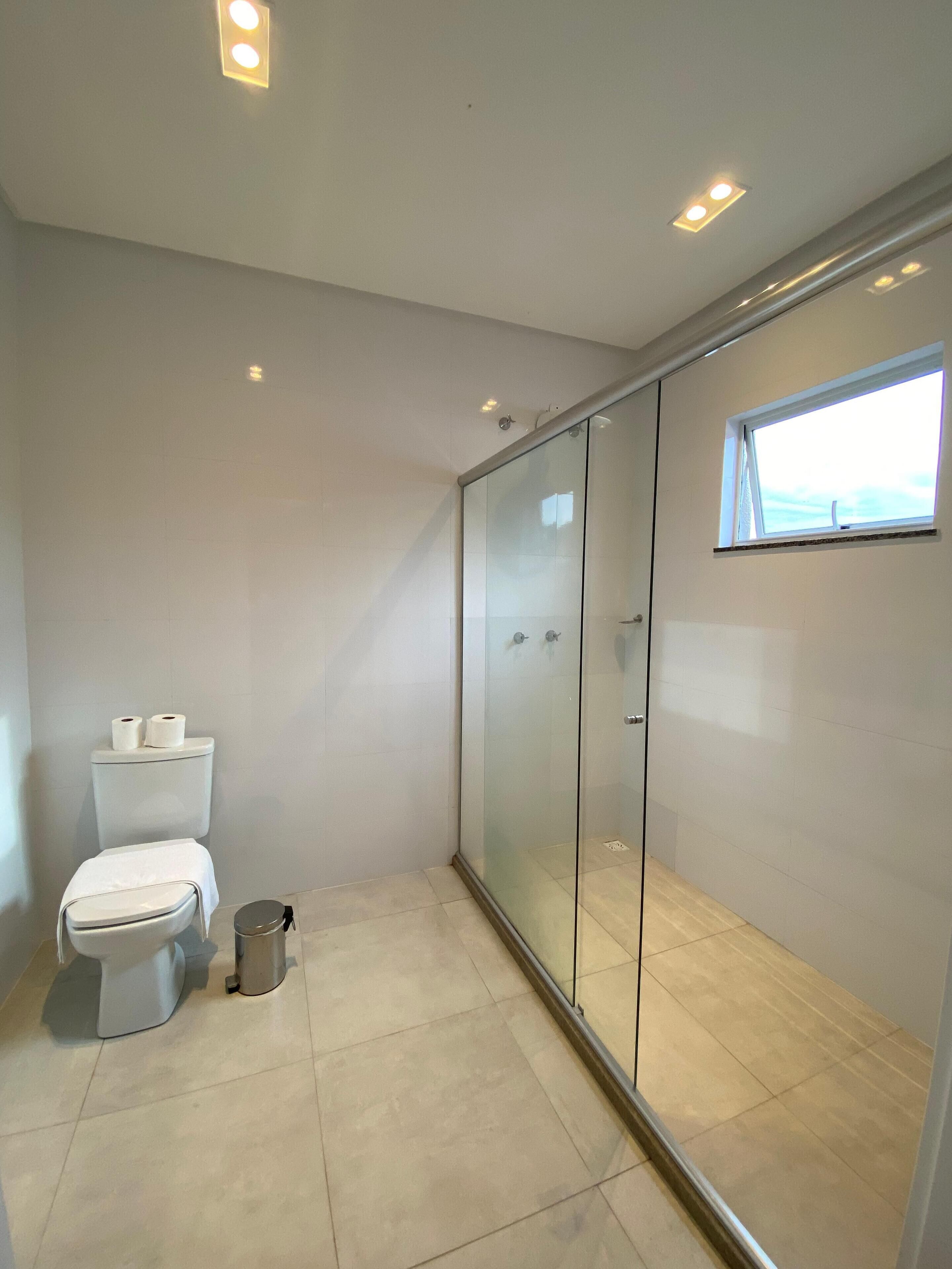 superior quadruple room | bathroom | shower, free toiletries, hair dryer, towels