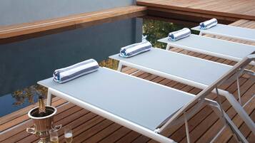 Outdoor pool, pool umbrellas, pool loungers