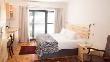 Wheelchair friendly suite (ground floor) | 1 bedroom, in-room safe, desk, blackout curtains