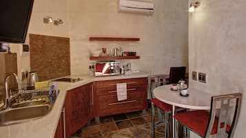 Standard Apartment, 1 Bedroom | Private kitchen | Fridge, microwave, stovetop, coffee/tea maker