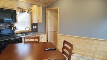 Deluxe Cabin, 2 Queen Beds, Non Smoking | Private kitchen | Fridge, microwave, coffee/tea maker