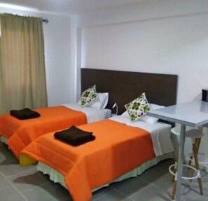 Standard Apartment, 2 Twin Beds | In-room safe, desk, soundproofing, iron/ironing board