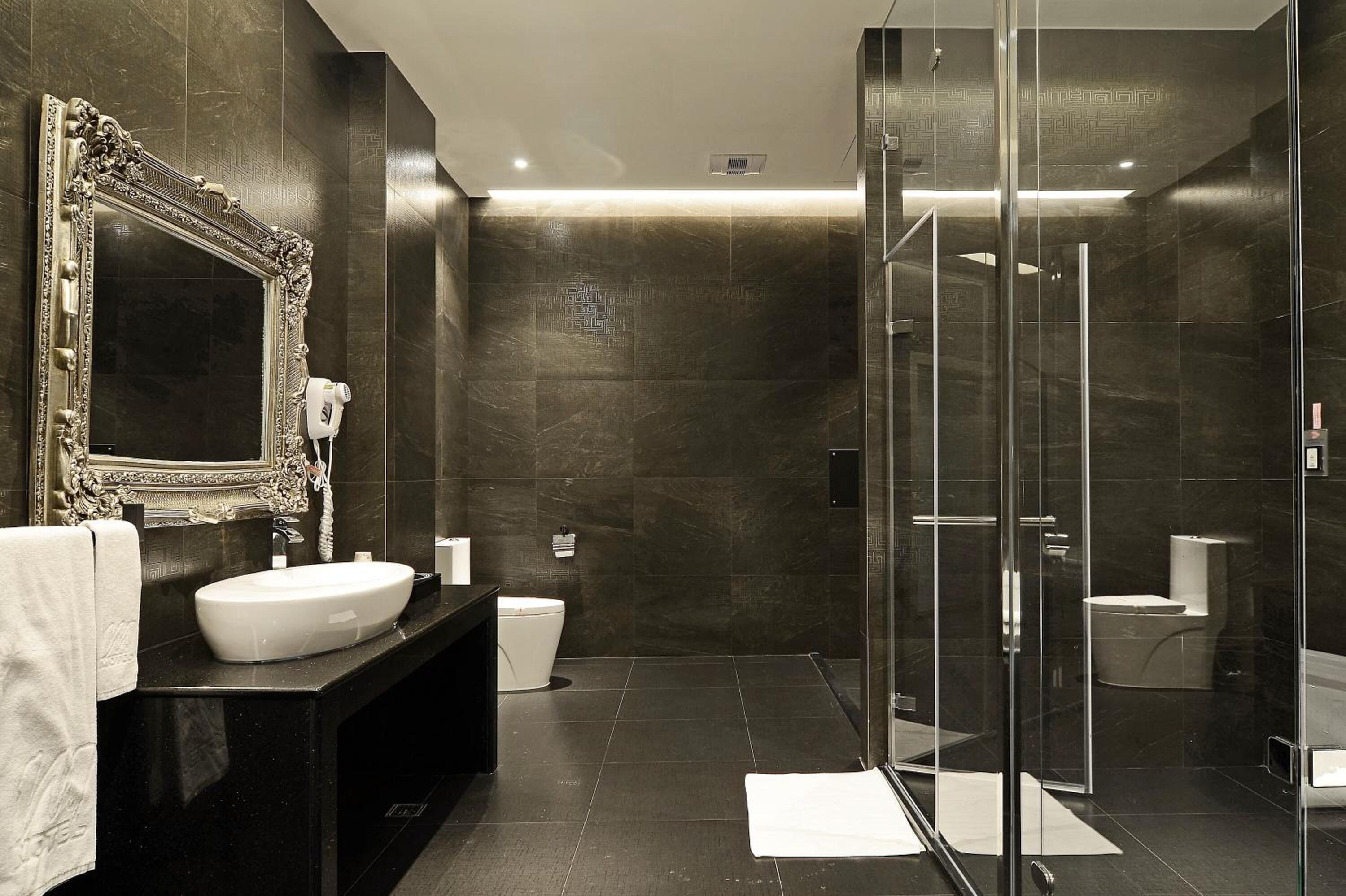 shower, free toiletries, hair dryer, slippers