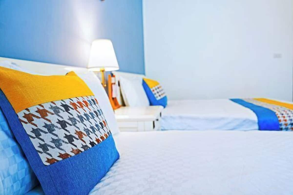 Premium bedding, individually furnished, desk, blackout curtains