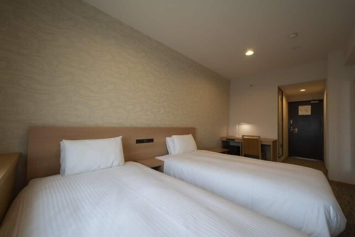 Desk, iron/ironing board (on request), WiFi (free), bed sheets