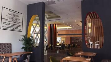 Breakfast, lunch, dinner served; local and international cuisine