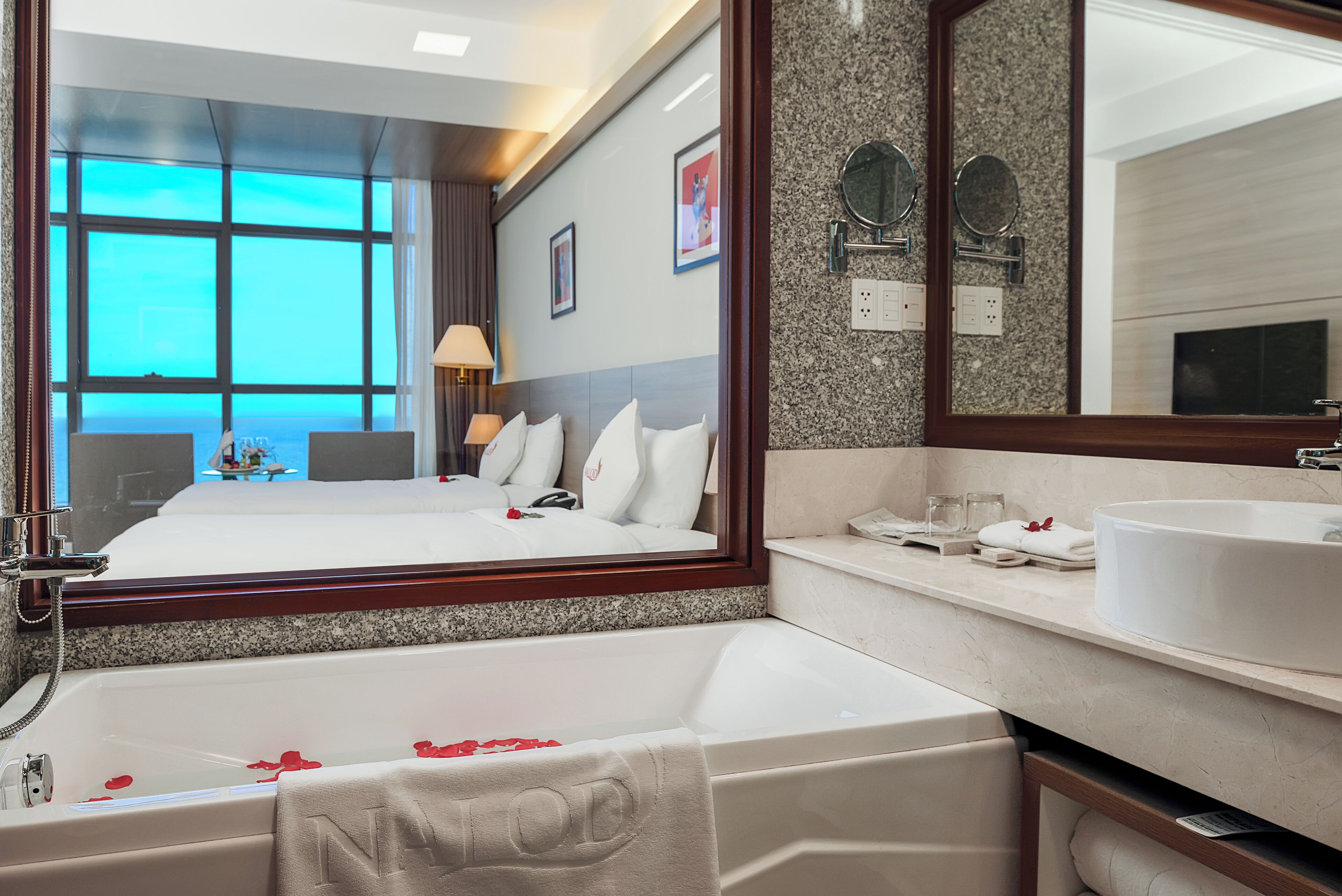 premier twin room, ocean view | bathroom | slippers, bidet