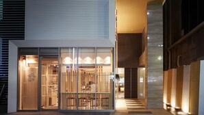 A modern building with a glass entrance, a wooden interior, and a checkered floor pattern. - Hotel Forza Hakataeki Chikushi - GuchiⅠ (Fukuoka)