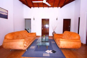 Triple Room, Accessible, Pool View | Living area