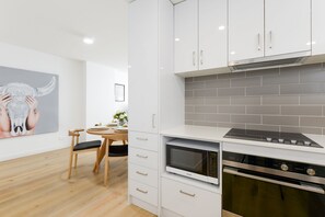 Apartment, 2 Bedrooms | Private kitchen | Full-size fridge, microwave, oven, stovetop