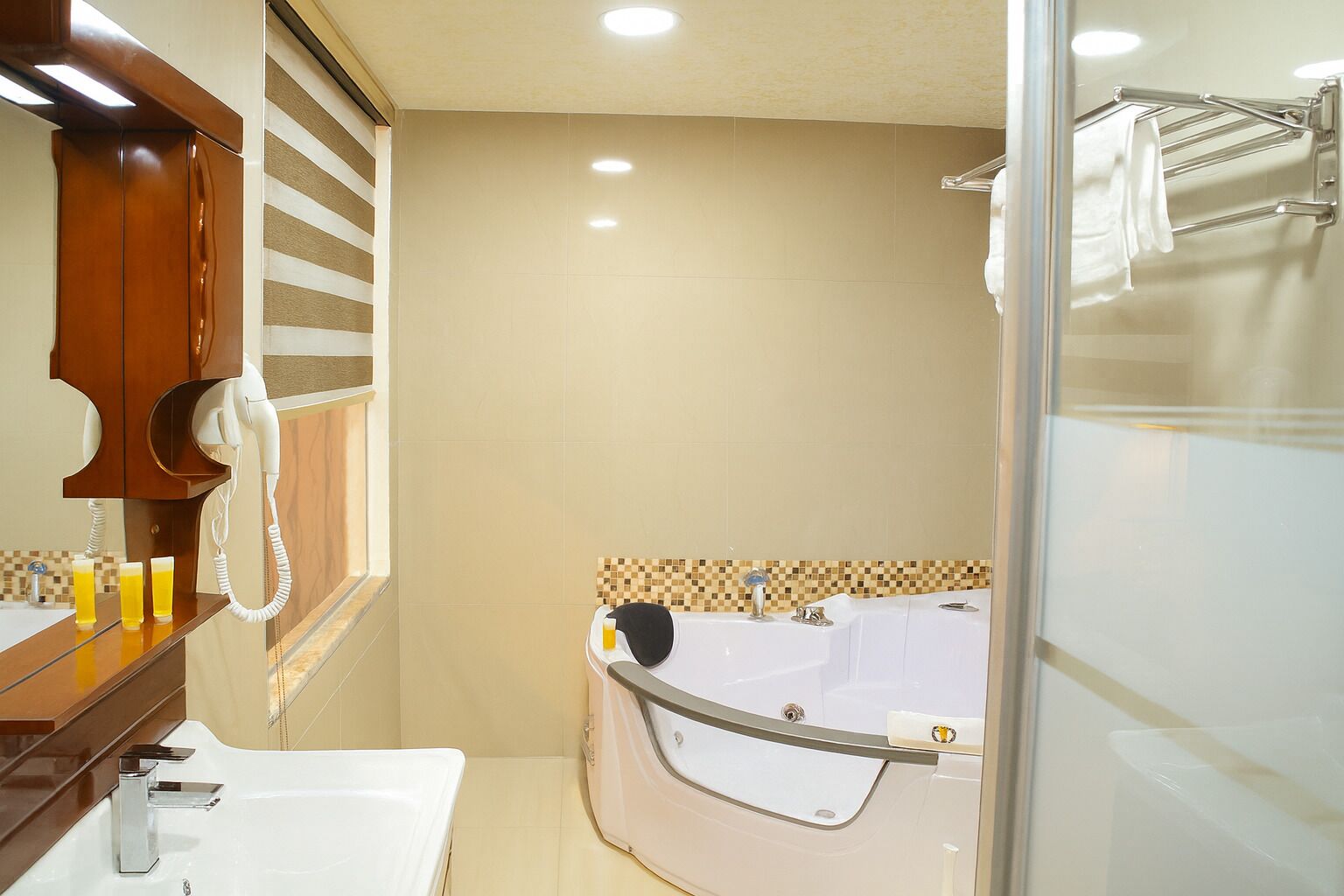 junior room, 1 king bed | bathroom | free toiletries, hair dryer, slippers, towels