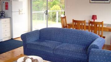 Cottage, 2 Bedrooms | Living area | Flat-screen TV, DVD player