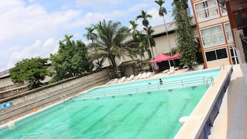 Outdoor pool, pool umbrellas, sun loungers