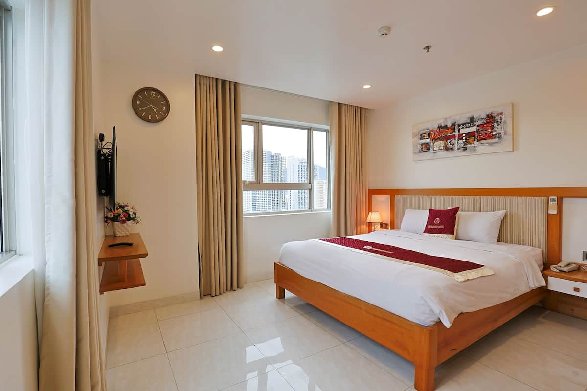 Family Room | 1 bedroom, premium bedding, minibar, in-room safe
