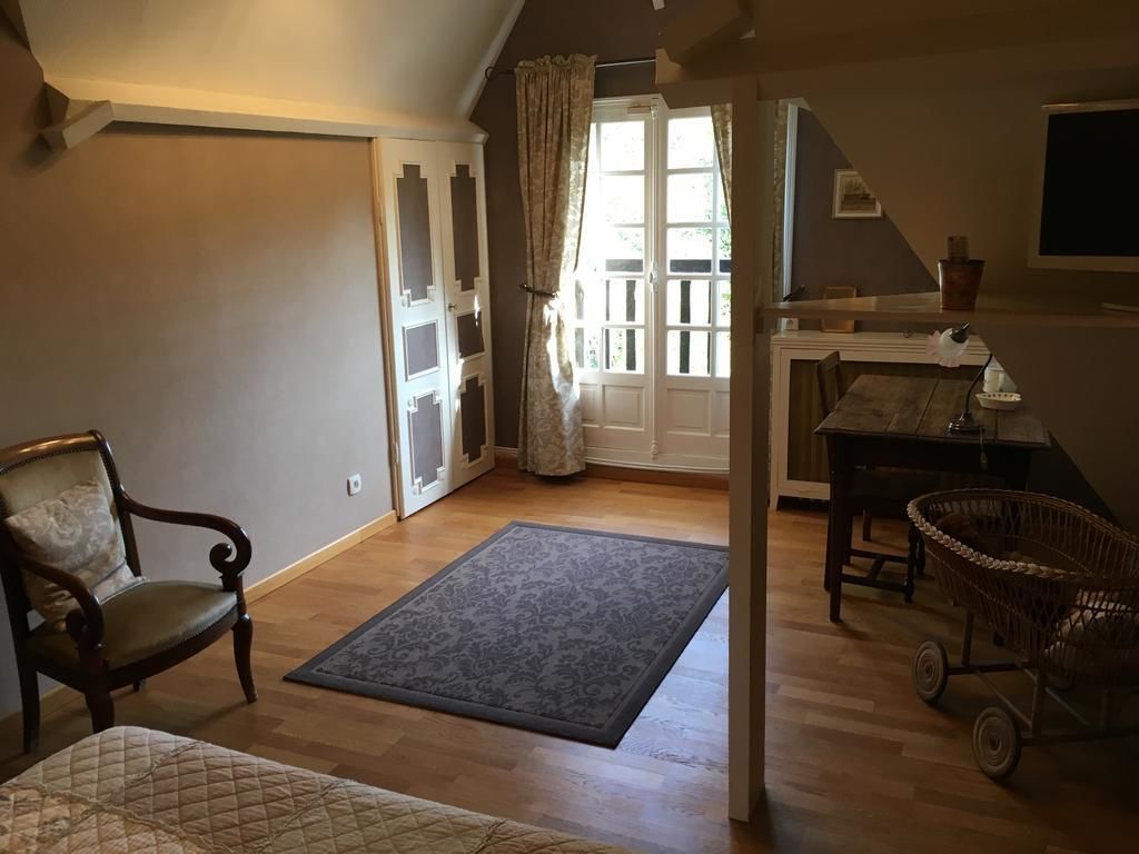 Double Room, Garden View (Cannelle) | Living area | Flat-screen TV