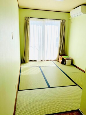 Japanese Style Twin Room (Number of Futon is varied depends on number of guest) | Iron/ironing board, bed sheets - Jouya (Ishigaki)