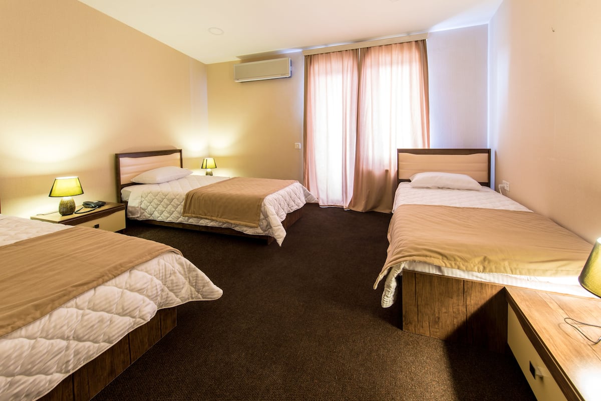Standard Triple Room | In-room safe, desk, soundproofing, iron/ironing board