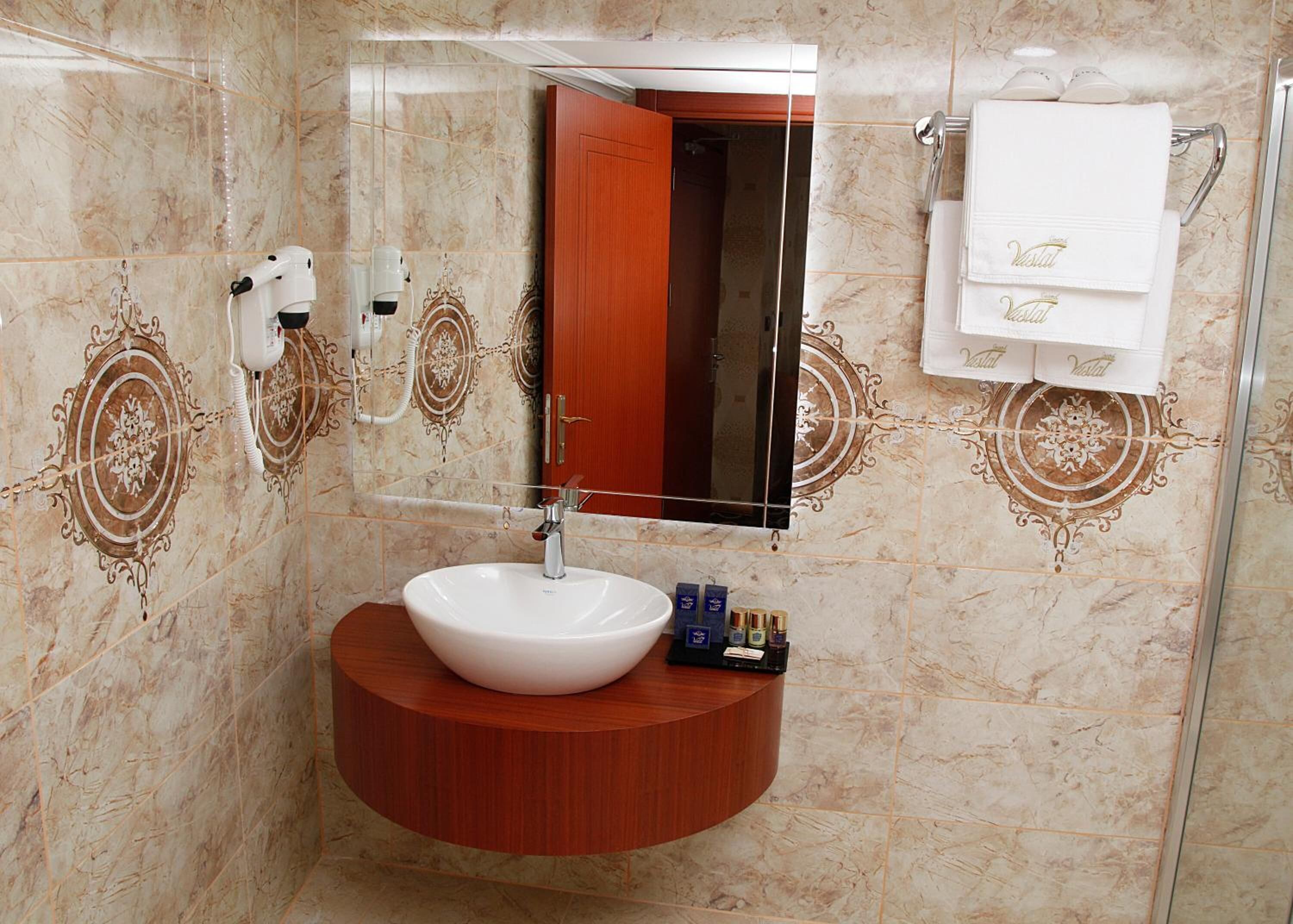 shower, free toiletries, hair dryer, slippers