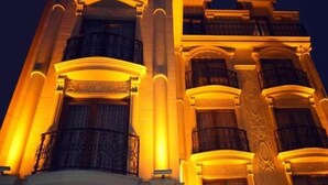A grand hotel entrance with multiple balconies and a classical architectural style. - Grand Vuslat Hotel (Trabzon)