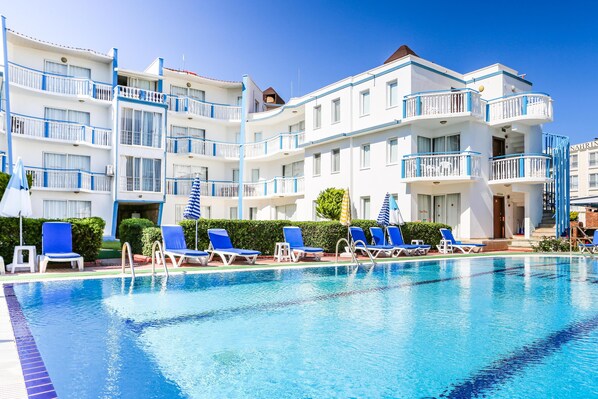 Outdoor pool, pool umbrellas, pool loungers