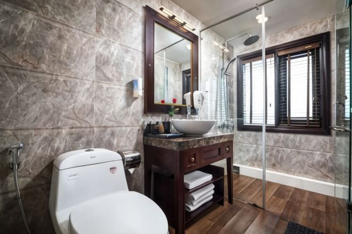 Bathroom | Shower, free toiletries, hair dryer, bathrobes
