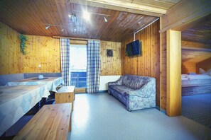 Apartment, 5 Bedrooms, Balcony (10-12/1) | Living area | 49-inch flat-screen TV with cable channels, TV, tablet - Gästehaus Rifa (Gaschurn)