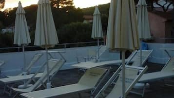 Seasonal outdoor pool, pool umbrellas, sun loungers