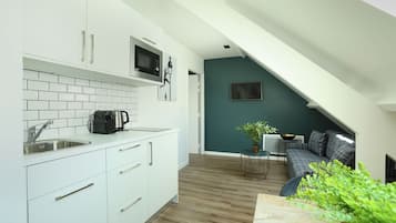Departamento, 1 habitación | Cocina privada | Refrigerador, microondas, horno y parrilla de estufa