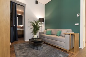 Junior Suite | Living room | 42-inch LCD TV with cable channels, TV - Dominic Smart & Luxury Suites Parliament (Belgrade)