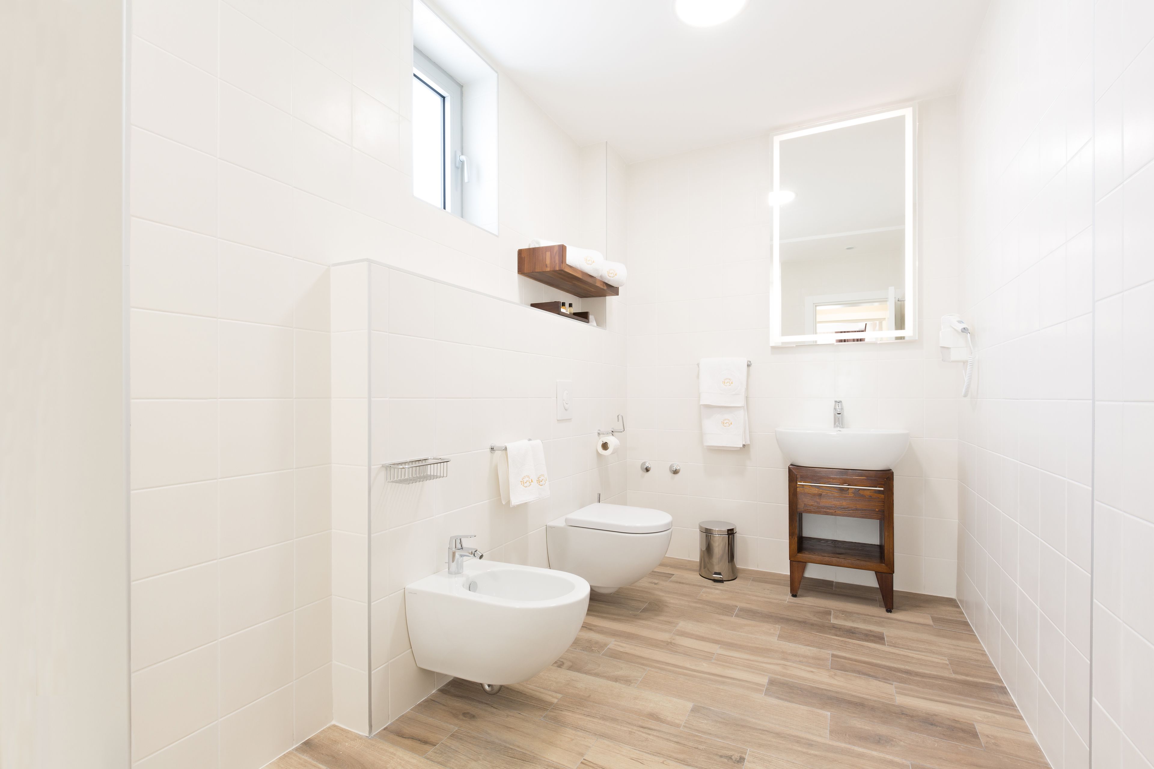 deluxe suite, 1 king bed with sofa bed, non smoking, balcony | bathroom | shower, rainfall showerhead, designer toiletries, hair dryer