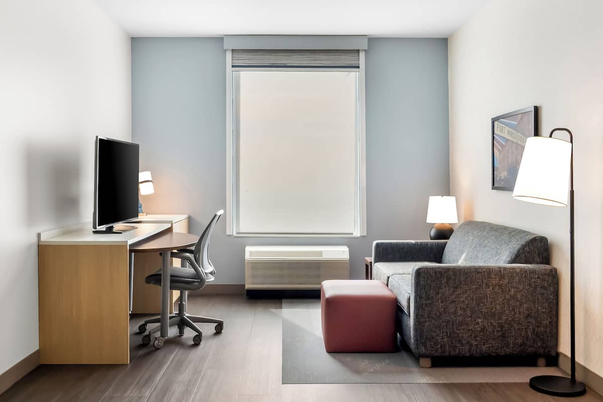 Desk, laptop workspace, free cots/infant beds, free WiFi