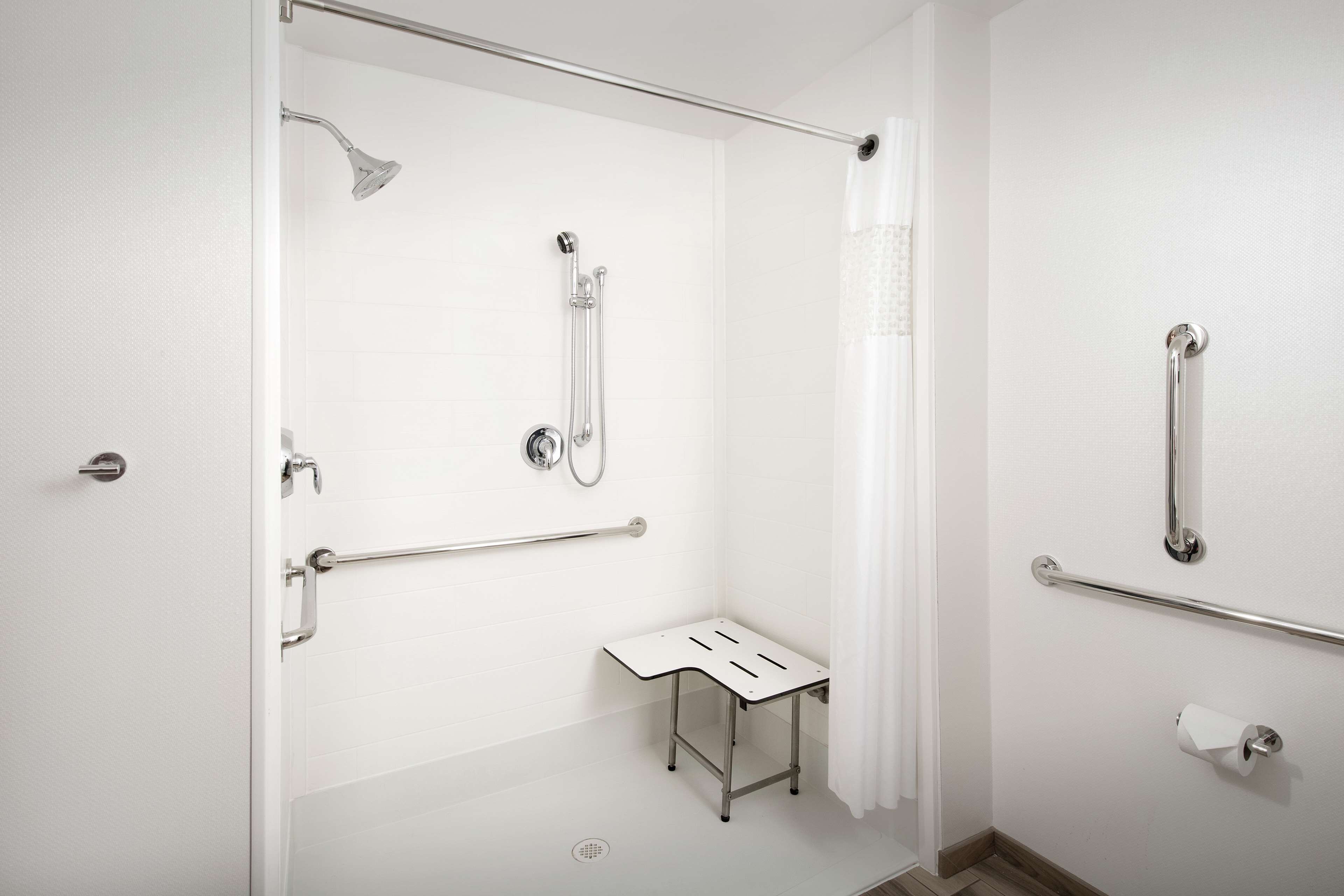 room, 1 king bed, accessible, non smoking (mobility & hearing, roll-in shower) | bathroom | combined shower/bathtub, hydromassage showerhead, free toiletries