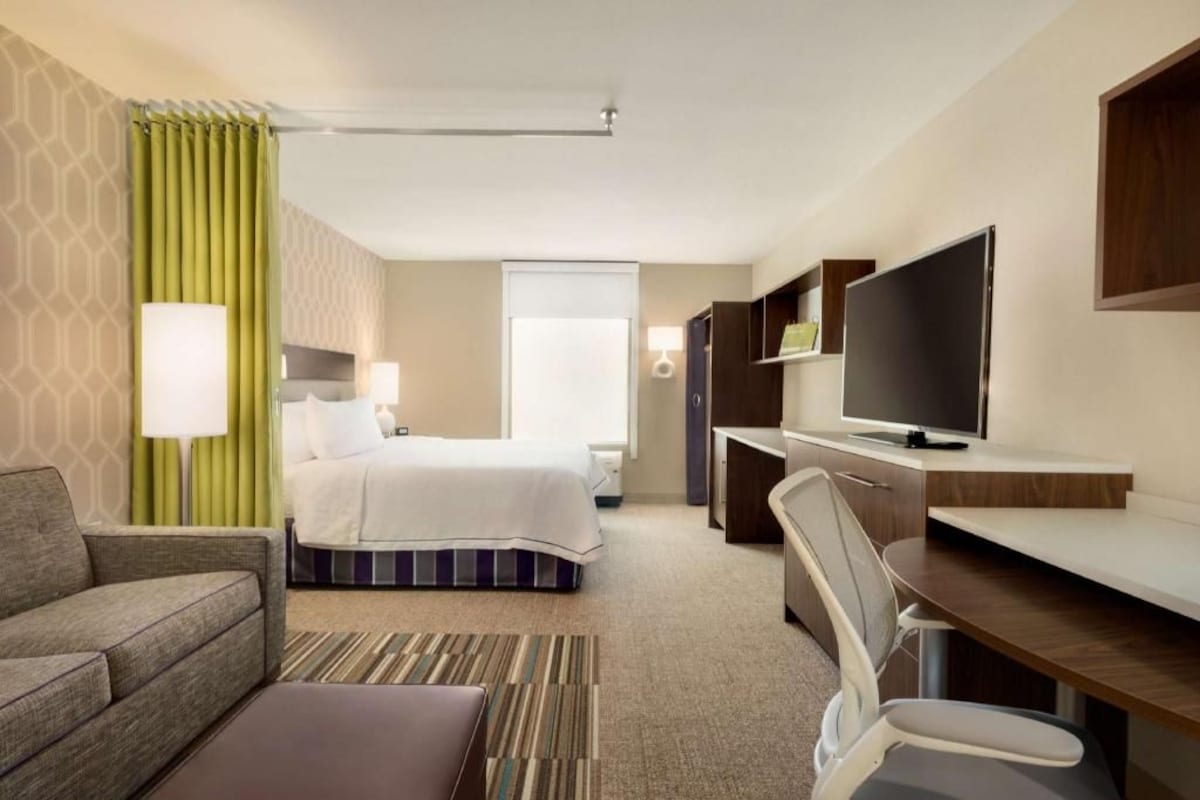 Hypo-allergenic bedding available, in-room safe, desk, laptop workspace