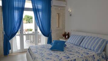 Deluxe Suite, Terrace | Premium bedding, down comforters, Select Comfort beds, blackout drapes