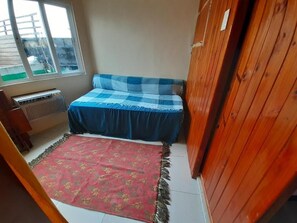 Blackout curtains, iron/ironing board, rollaway beds, free WiFi