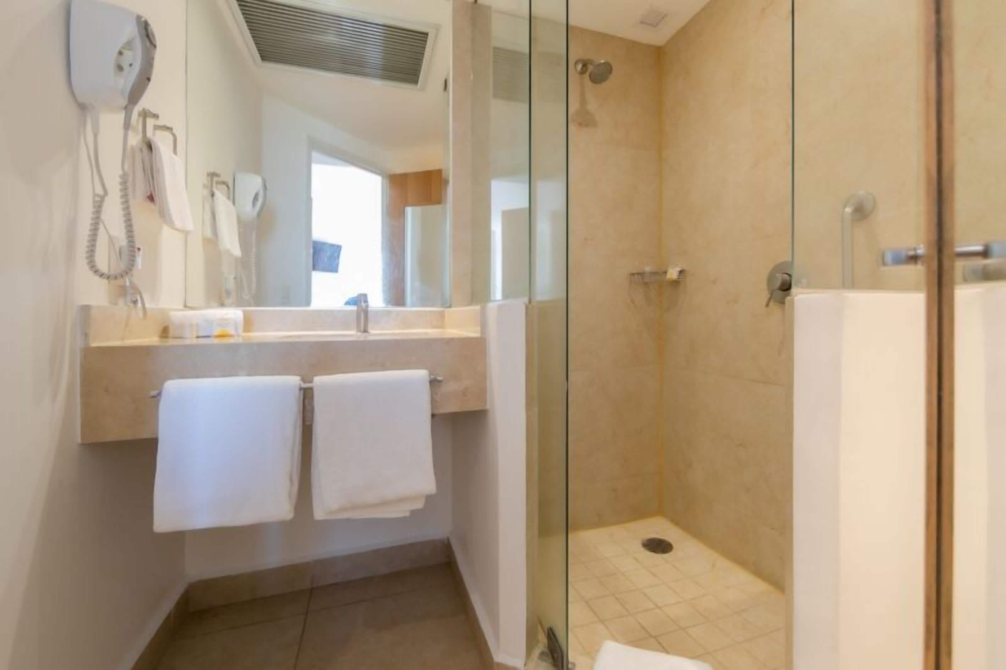 shower, free toiletries, hair dryer, towels