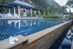 Outdoor pool, pool umbrellas, pool loungers