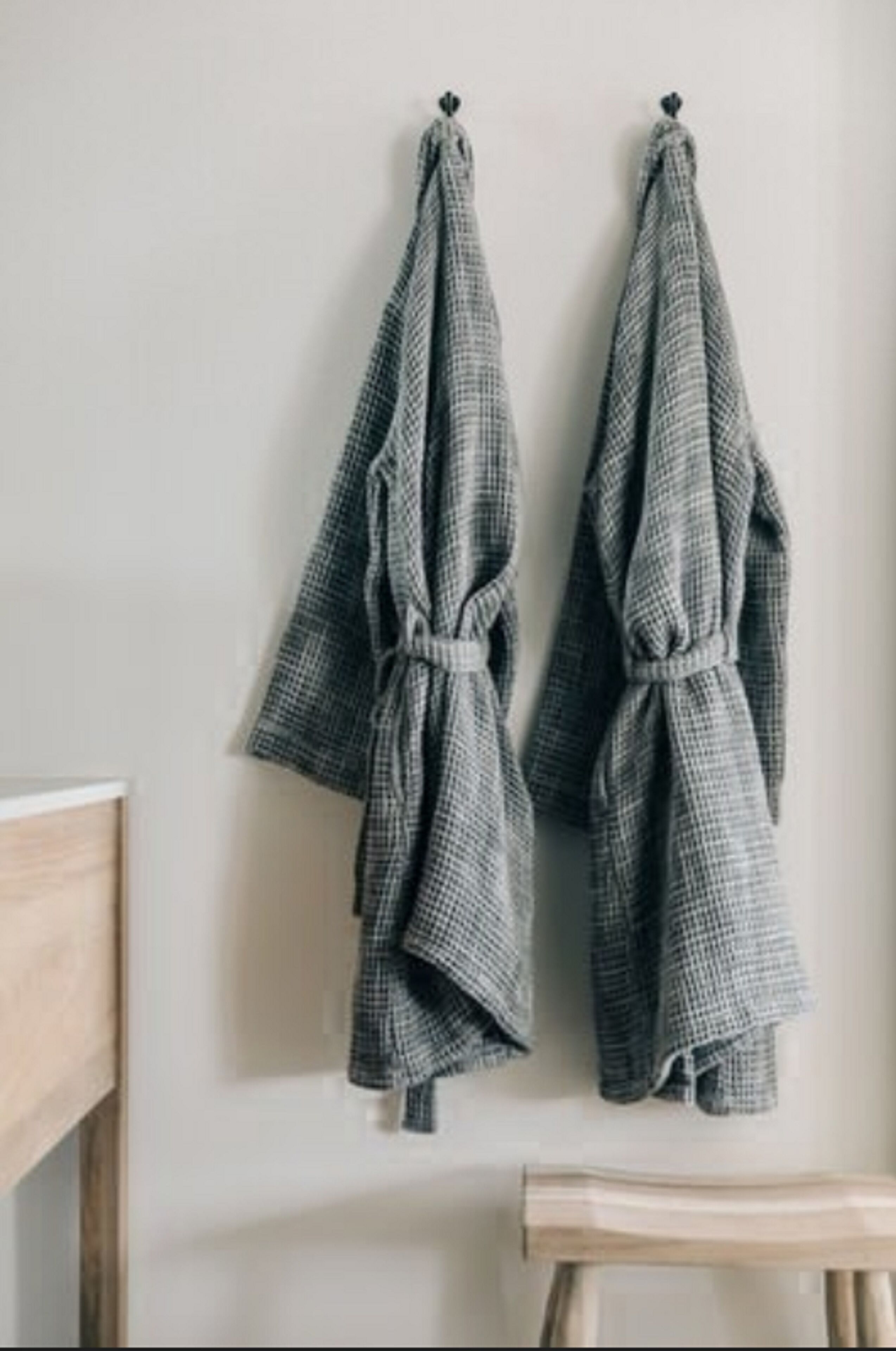 designer toiletries, hair dryer, bathrobes, towels