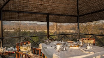 Breakfast, lunch, dinner served; Indian cuisine, pool views