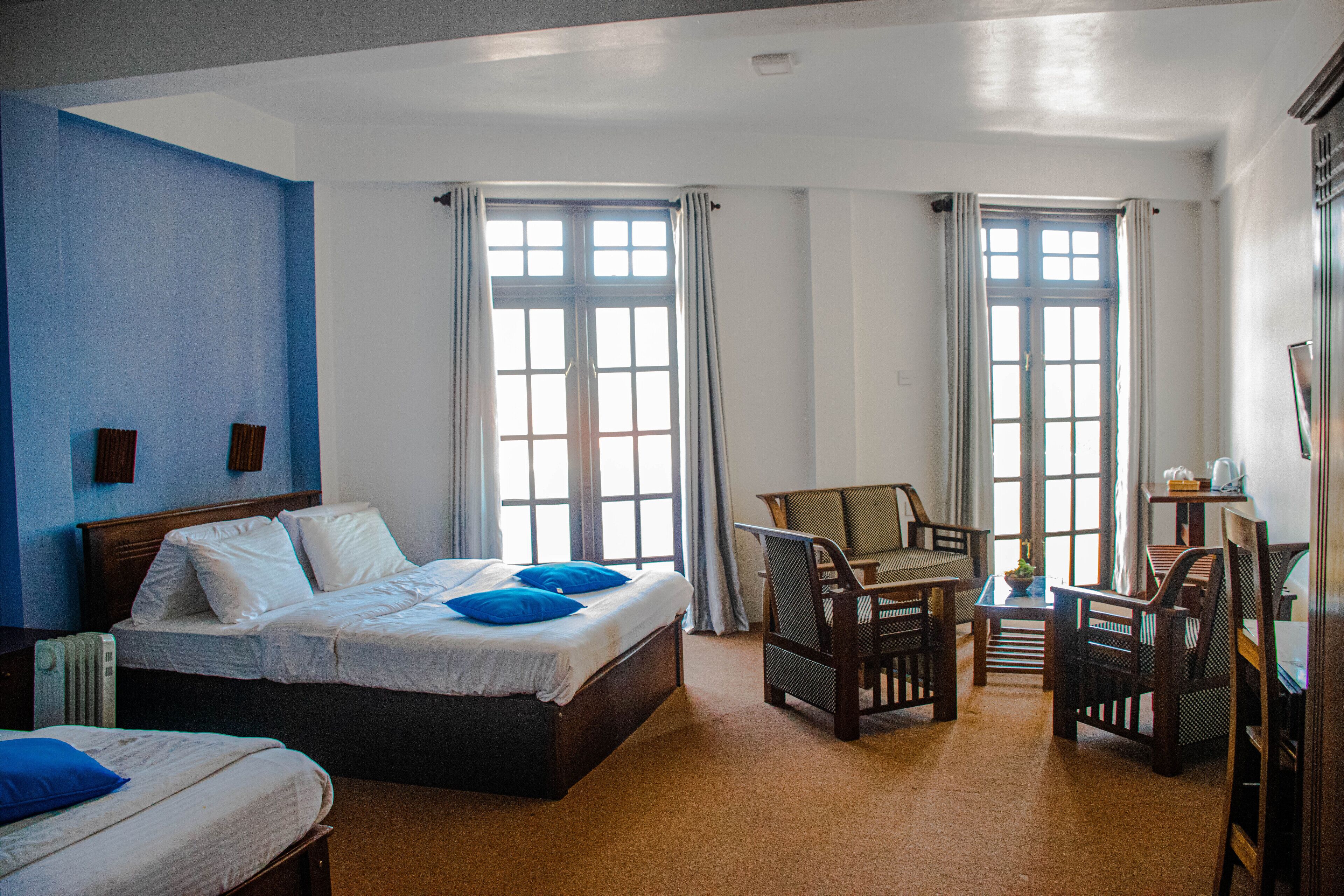 family quadruple room, mountain view | individually decorated, individually furnished, desk, laptop workspace