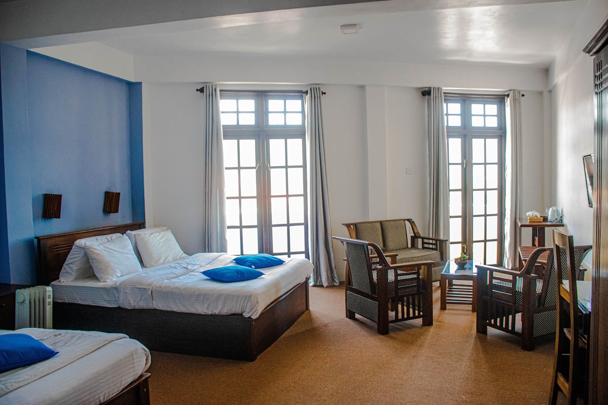 family quadruple room, mountain view | individually decorated, individually furnished, desk, laptop workspace