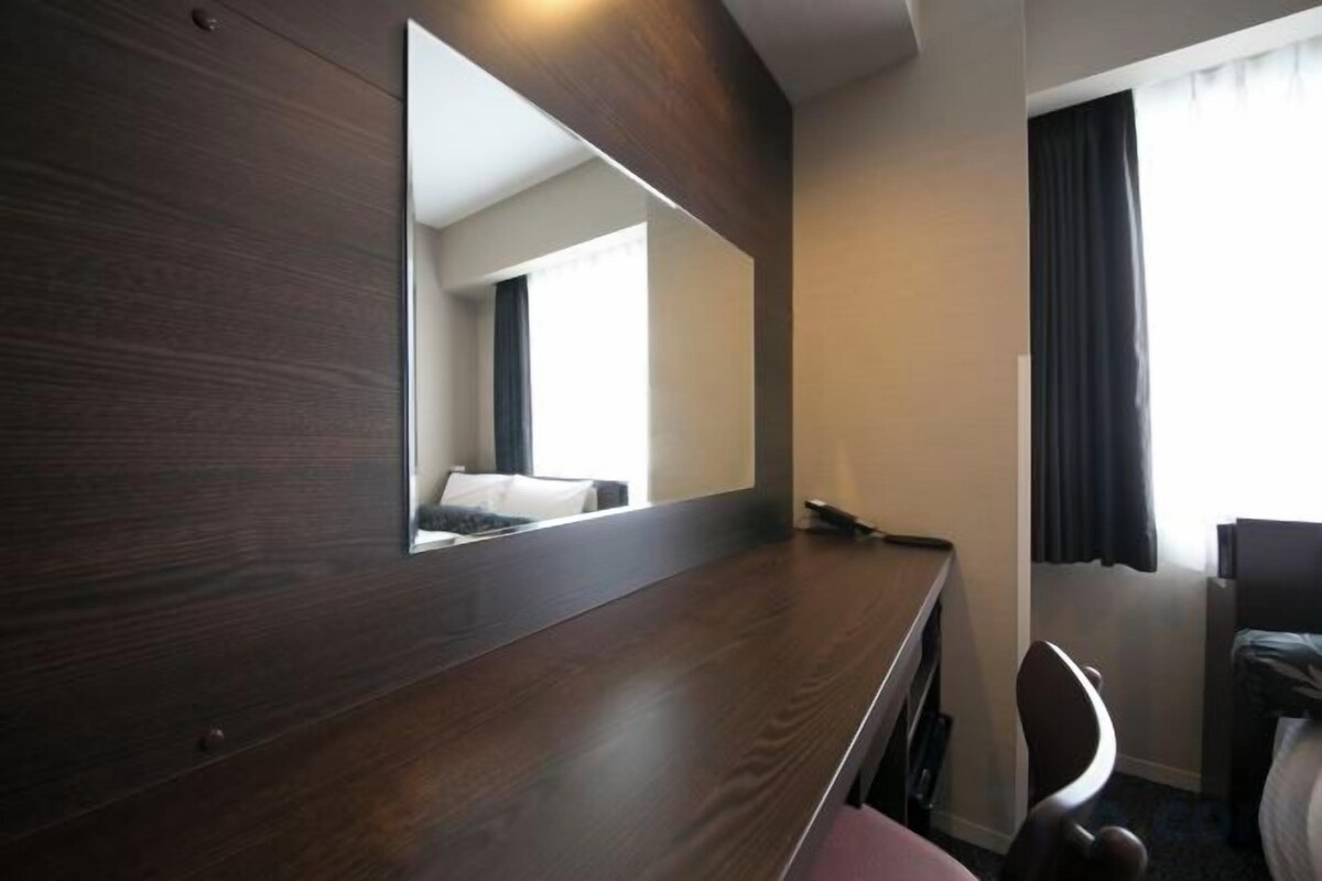 Desk, iron/ironing board (on request), WiFi (free), bed sheets