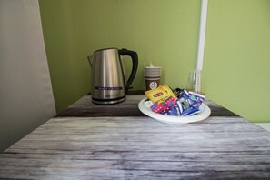 Habitació doble per a ús individual | Cafè i cafetera